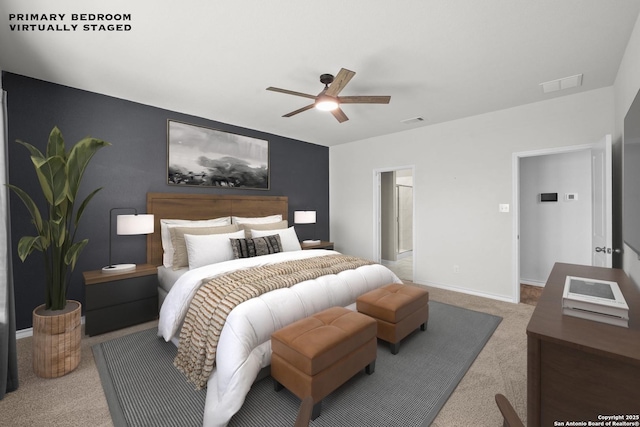 carpeted bedroom featuring baseboards and ceiling fan