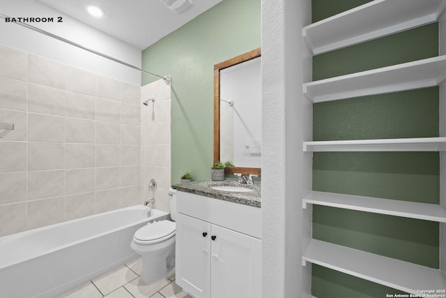 bathroom featuring toilet, vanity, tub / shower combination, and tile patterned flooring