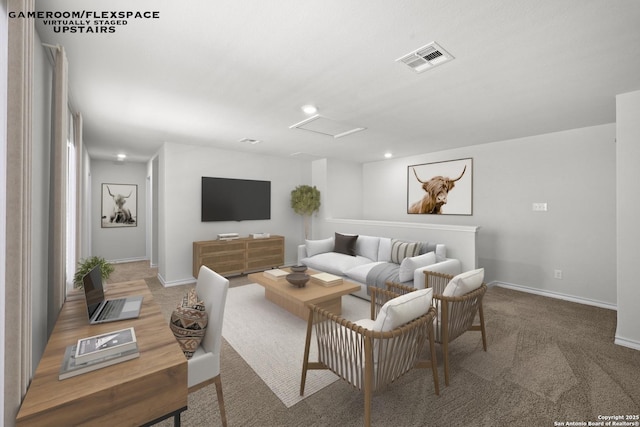 living room featuring attic access, baseboards, carpet floors, and recessed lighting