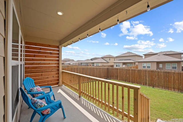 balcony featuring a residential view