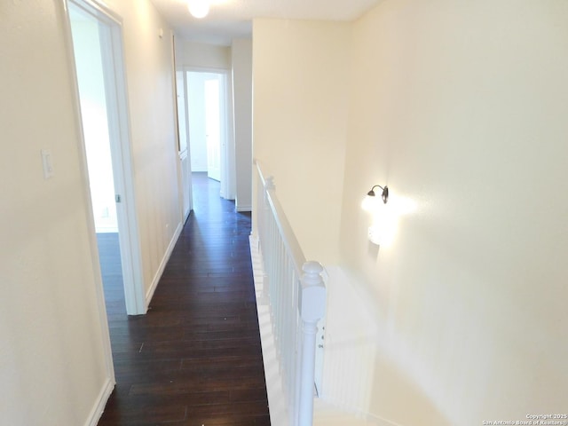 8918 Kenton Mist, San Antonio, TX 78240 - hallway featuring an upstairs landing, dark wood-style floors, and baseboards