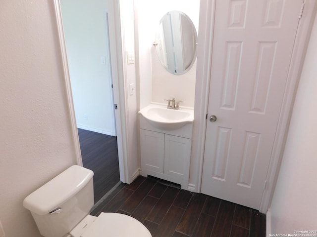 8918 Kenton Mist, San Antonio, TX 78240 - half bath featuring wood finished floors, toilet, and vanity