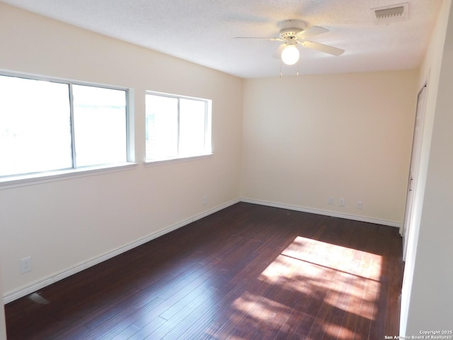 8918 Kenton Mist, San Antonio, TX 78240 - spare room with a ceiling fan, dark wood finished floors, and baseboards