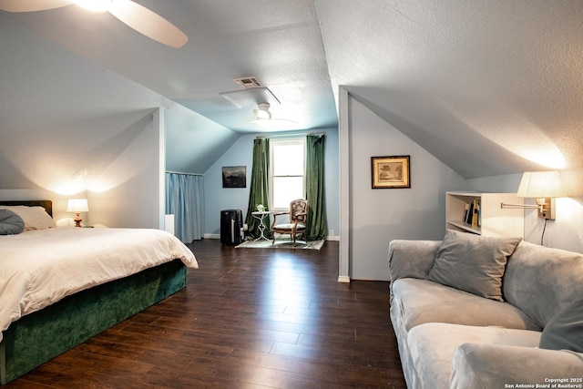243 N, San Antonio, TX 78201 - bedroom featuring dark wood-style flooring, vaulted ceiling, baseboards, a textured ceiling, and ceiling fan