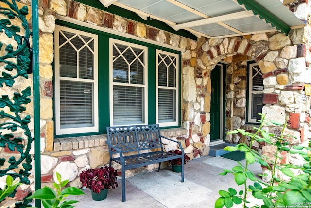 243 N, San Antonio, TX 78201 - property entrance with stone siding and covered porch
