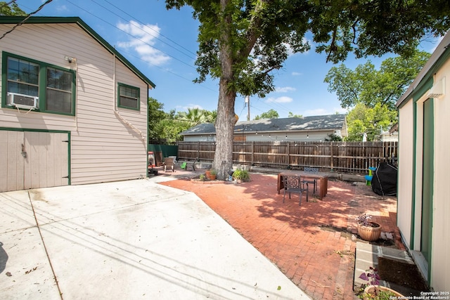 243 N, San Antonio, TX 78201 - fenced backyard with a patio area
