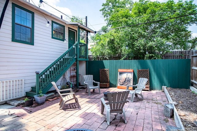 243 N, San Antonio, TX 78201 - fenced backyard with a patio area and stairs