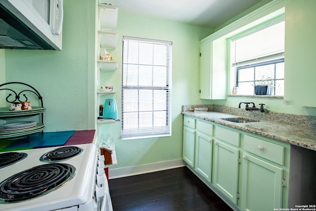 243 N, San Antonio, TX 78201 - kitchen featuring white appliances, a sink, baseboards, dark wood-style floors, and light stone counters