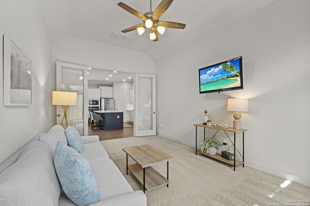 435 Bridle Trl, New Braunfels, TX 78132 - living room featuring vaulted ceiling, a ceiling fan, baseboards, and carpet floors