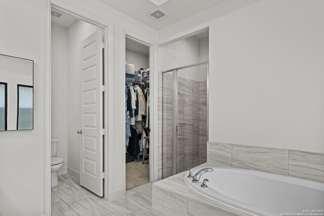 435 Bridle Trl, New Braunfels, TX 78132 - full bathroom with a shower stall, a spacious closet, toilet, and a bath