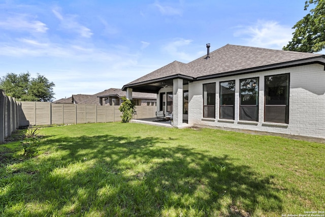 435 Bridle Trl, New Braunfels, TX 78132 - rear view of house with ceiling fan, a shingled roof, and a patio area