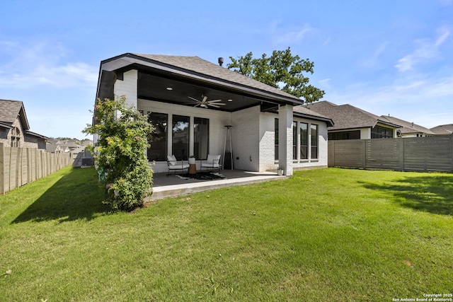 435 Bridle Trl, New Braunfels, TX 78132 - back of house featuring ceiling fan, brick siding, a patio area, and a shingled roof