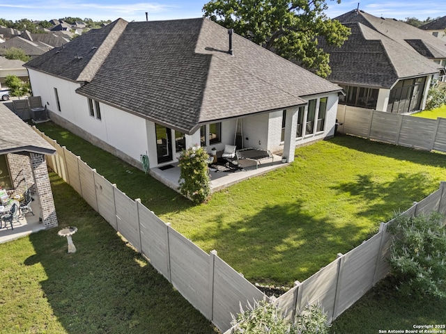 435 Bridle Trl, New Braunfels, TX 78132 - back of house with a shingled roof and a patio