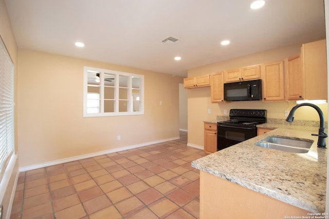 6614 Spring Hurst, San Antonio, TX 78249 - kitchen featuring black appliances, a sink, light brown cabinets, light tile patterned floors, and recessed lighting