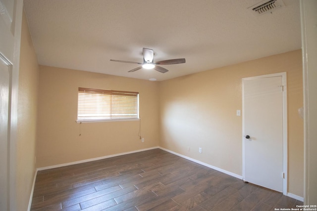 6614 Spring Hurst, San Antonio, TX 78249 - unfurnished room featuring a ceiling fan, dark wood-style floors, and baseboards