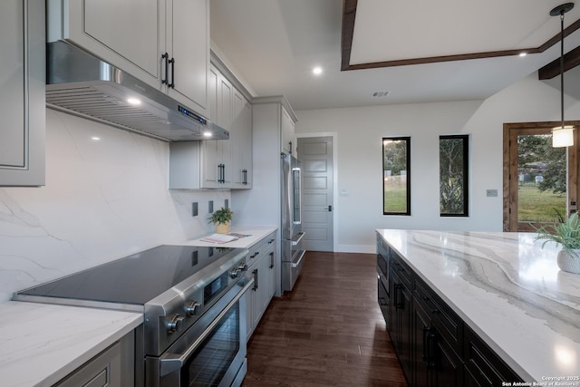 3045 Campestres, Spring Branch, TX 78070 - kitchen with stainless steel appliances, under cabinet range hood, dark wood-style flooring, light stone countertops, and recessed lighting