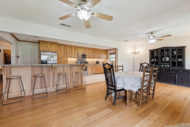 101 Cynthia, Pleasanton, TX 78064 - dining space with a ceiling fan and light wood-style floors