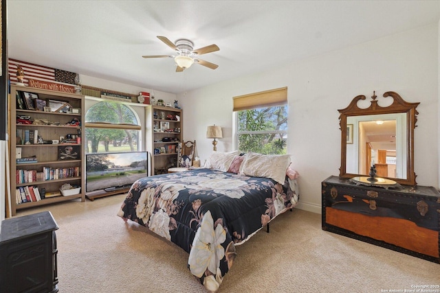 101 Cynthia, Pleasanton, TX 78064 - bedroom with multiple windows, carpet, and a ceiling fan