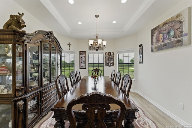 1110 Atascosa County Road 101, Floresville, TX 78114 - dining area with a chandelier, a tray ceiling, light wood finished floors, recessed lighting, and crown molding