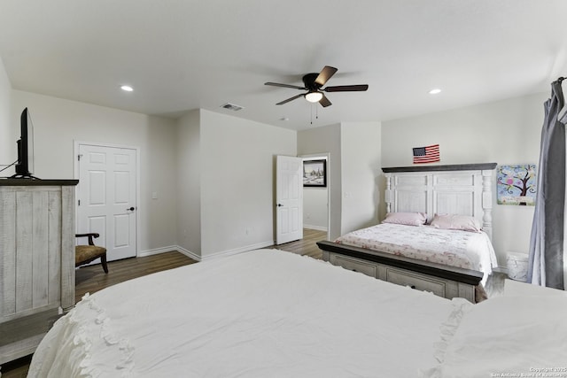 1110 Atascosa County Road 101, Floresville, TX 78114 - bedroom featuring wood finished floors, baseboards, a ceiling fan, and recessed lighting