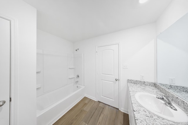 12056 Luckey Villa, San Antonio, TX 78252 - bathroom with wood finished floors, vanity, and tub / shower combination