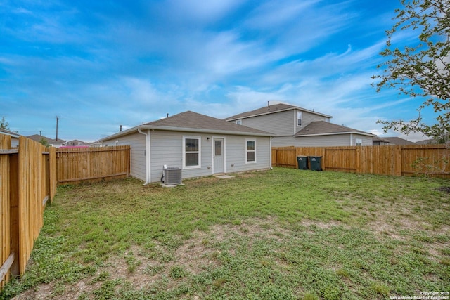 12056 Luckey Villa, San Antonio, TX 78252 - back of house with central air condition unit and roof with shingles