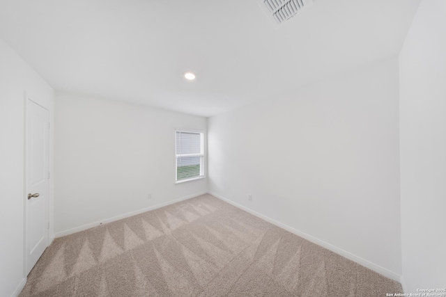 12056 Luckey Villa, San Antonio, TX 78252 - spare room featuring carpet flooring, baseboards, and recessed lighting