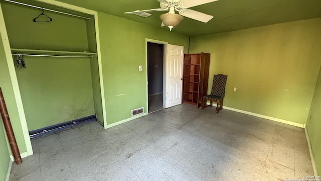 1906 Perlita, San Antonio, TX 78224 - unfurnished bedroom with baseboards, a closet, and a ceiling fan