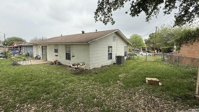 1906 Perlita, San Antonio, TX 78224 - back of property featuring a patio area and cooling unit