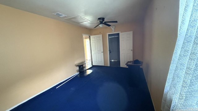 1906 Perlita, San Antonio, TX 78224 - unfurnished bedroom with a closet, a ceiling fan, and carpet flooring