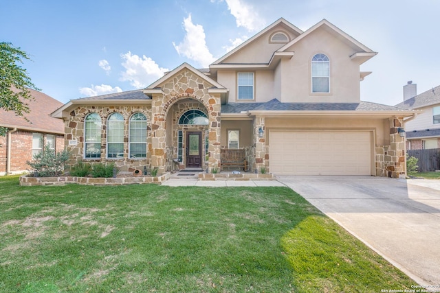 view of front facade with stone siding, stucco siding, driveway, and an attached garage