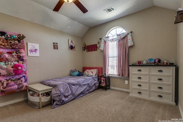 bedroom featuring vaulted ceiling, light carpet, multiple windows, ceiling fan, and baseboards