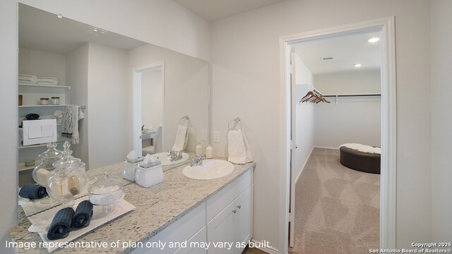 1435 Chianti Pass, New Braunfels, TX 78130 - full bathroom with a spacious closet, vanity, baseboards, and recessed lighting