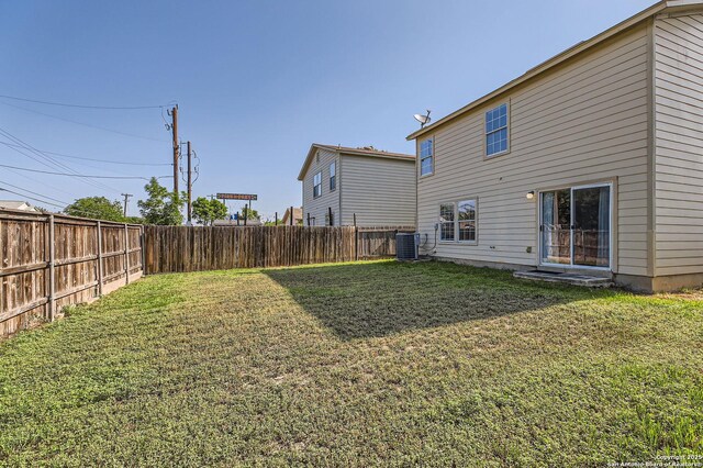back of property featuring central air condition unit