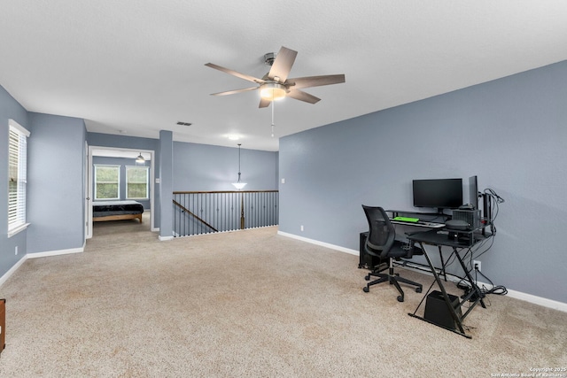 10607 Carmona, Helotes, TX 78023 - carpeted home office featuring a ceiling fan and baseboards