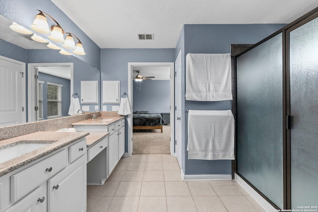 10607 Carmona, Helotes, TX 78023 - bathroom featuring ensuite bath, ceiling fan, vanity, tile patterned floors, and a stall shower