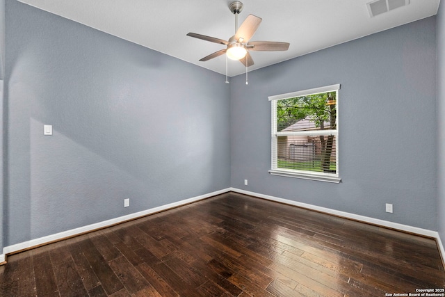 10607 Carmona, Helotes, TX 78023 - unfurnished room with hardwood / wood-style floors, ceiling fan, and baseboards
