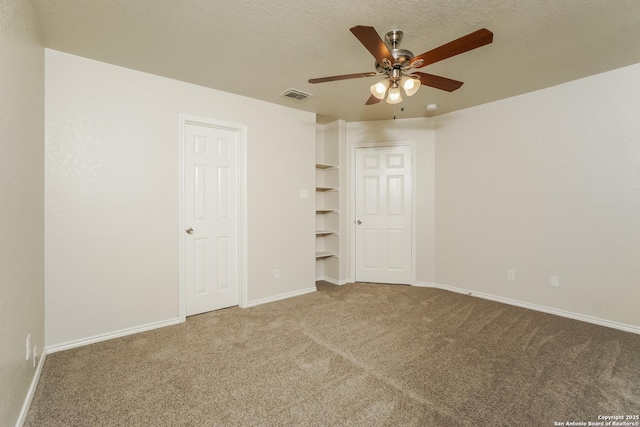 5503 Hidden, San Antonio, TX 78252 - unfurnished bedroom with carpet flooring, baseboards, and a ceiling fan