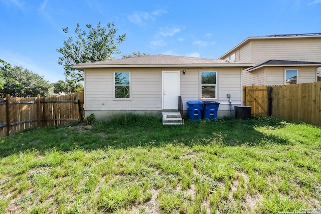 5503 Hidden, San Antonio, TX 78252 - rear view of house featuring a fenced backyard and entry steps