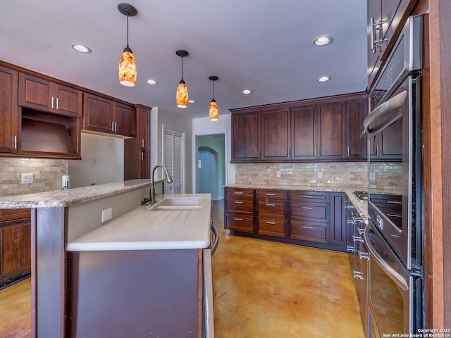 12802 Country Crst, San Antonio, TX 78216 - kitchen featuring a sink, recessed lighting, backsplash, finished concrete floors, and decorative light fixtures