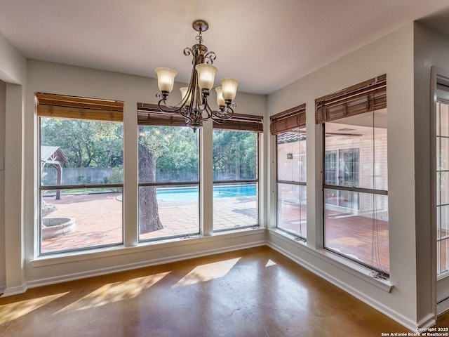 12802 Country Crst, San Antonio, TX 78216 - unfurnished dining area featuring baseboards and a chandelier
