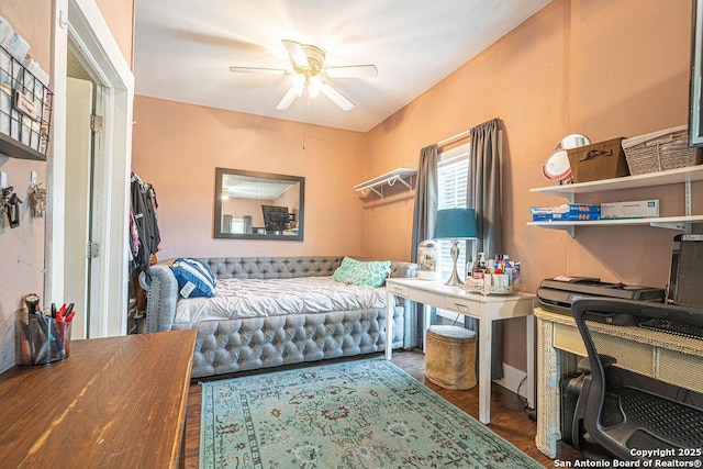 1004 Leona, Cotulla, TX 78014 - bedroom featuring a desk and wood finished floors