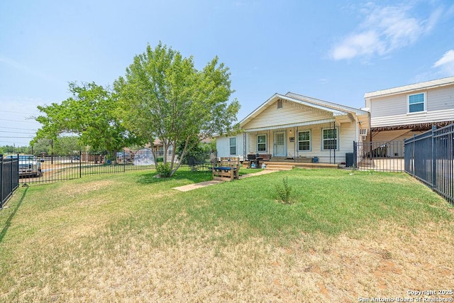 1004 Leona, Cotulla, TX 78014 - rear view of house featuring a porch