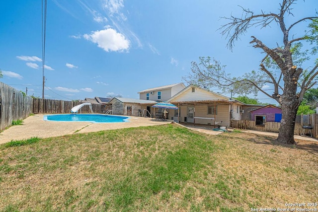 1004 Leona, Cotulla, TX 78014 - view of pool featuring a water slide and a patio
