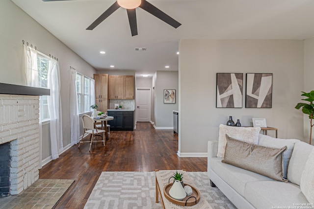 1641 W Huisache, San Antonio, TX 78201 - living area with ceiling fan, dark wood-style floors, a brick fireplace, baseboards, and recessed lighting