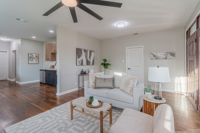 1641 W Huisache, San Antonio, TX 78201 - living room with dark wood finished floors, ceiling fan, baseboards, and recessed lighting