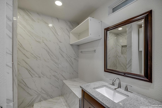 2802 Bent Bow, San Antonio, TX 78209 - bathroom featuring vanity, a marble finish shower, and recessed lighting