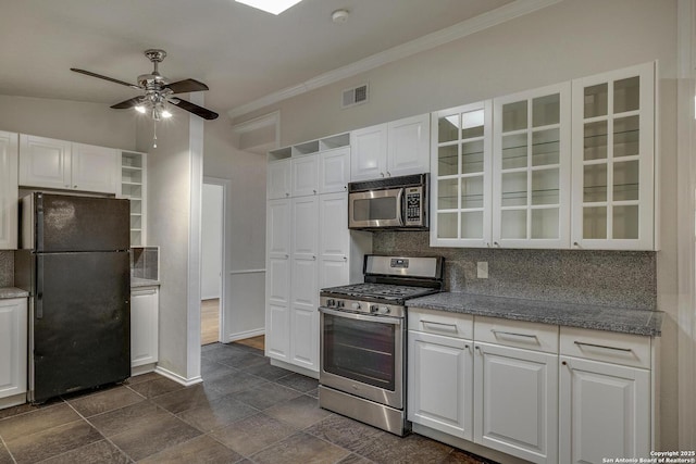 2802 Bent Bow, San Antonio, TX 78209 - kitchen featuring stainless steel appliances, a ceiling fan, glass insert cabinets, tasteful backsplash, and white cabinetry