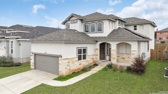 6514 Comanche Post, San Antonio, TX 78233 - view of front of house featuring roof with shingles, stucco siding, a garage, and driveway