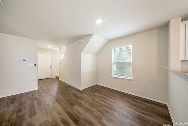 13758 Prospector Post, San Antonio, TX 78253 - additional living space featuring baseboards, dark wood finished floors, recessed lighting, and lofted ceiling